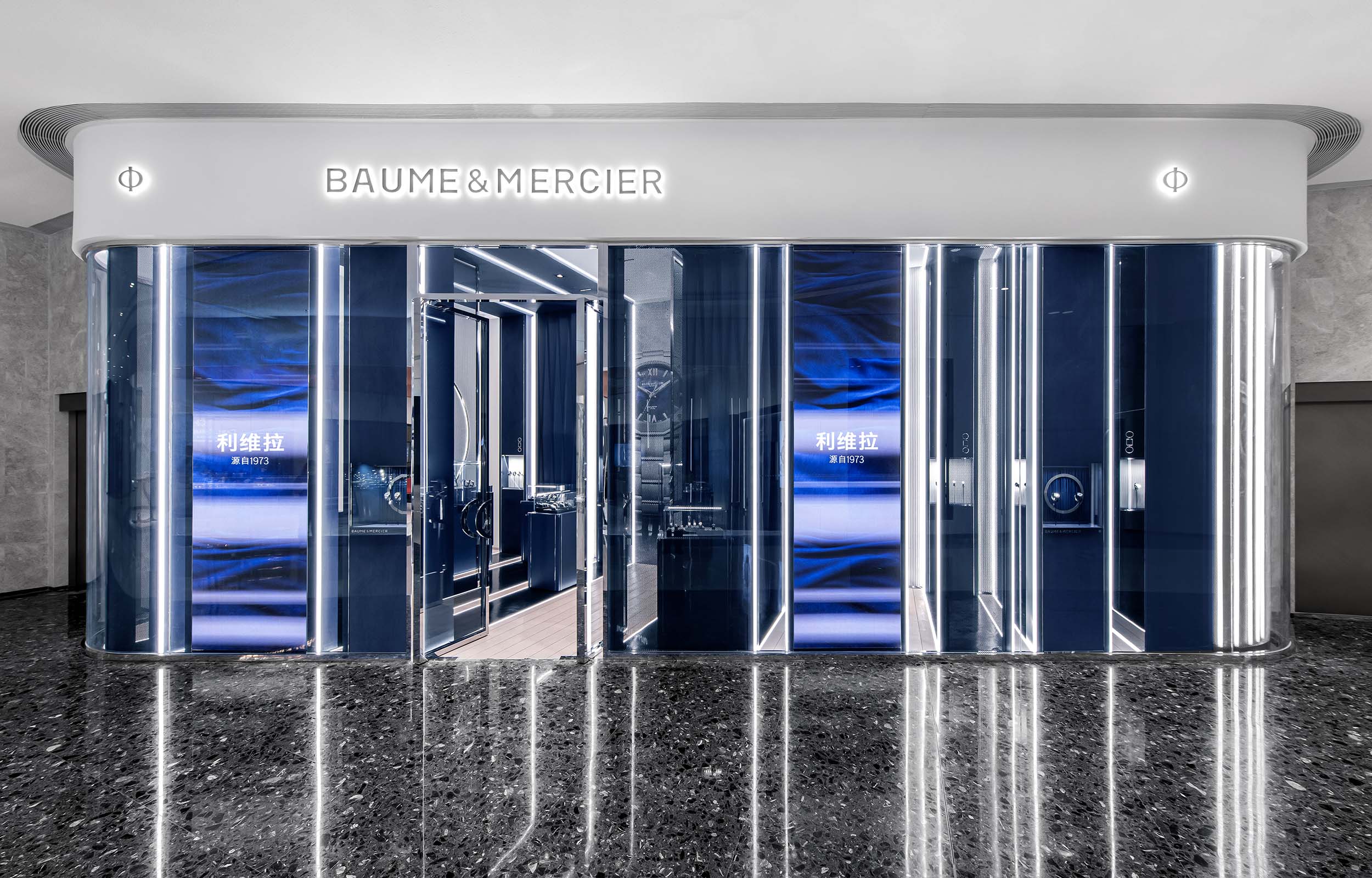 Pop-Up Boutique-Konzept Uhrenladen. Ansicht Fassade mit LED Screens. Baume & Mercier - MACH Architektur.